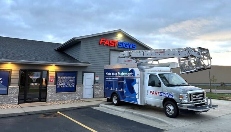 An image of the new van ladder with FASTSIGNS logo.